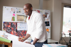 African American creative professional at drafting board.