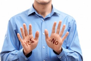 Close-up of man showing his palms with choice no or yes