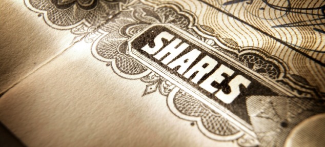 Shares certificate in brown and cream ink on white background