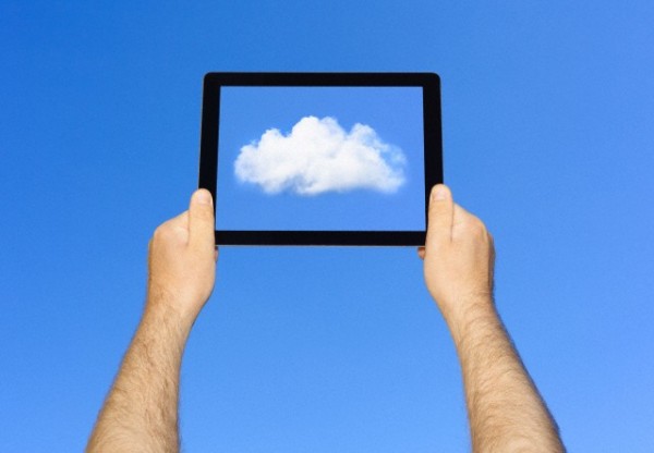 Man viewing cloud on tablet computer