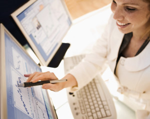 Woman Extract Data Computer Screen