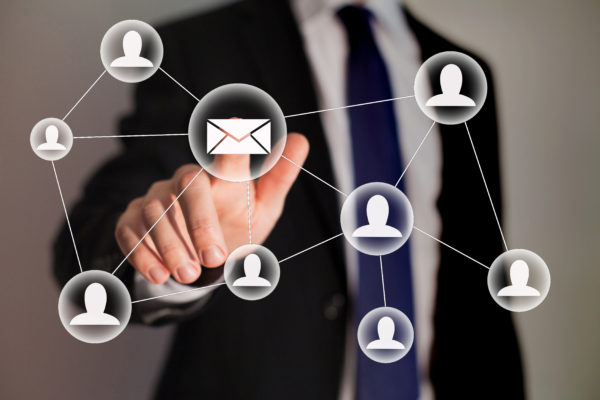 business man pressing an envelope