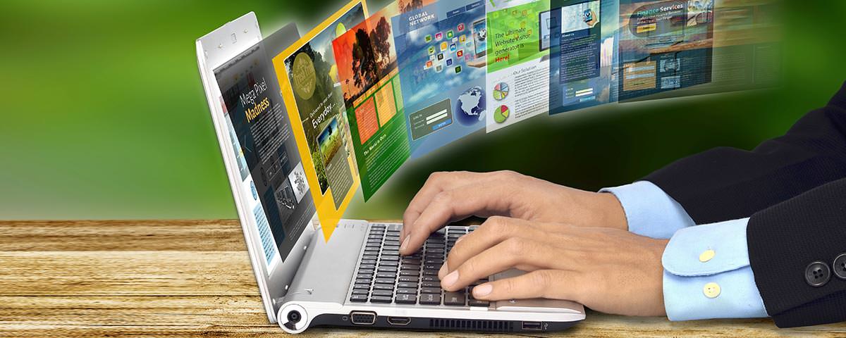 An employee browsing the Internet on a laptop computer with different websites that are being tracked by the Internet monitoring software.