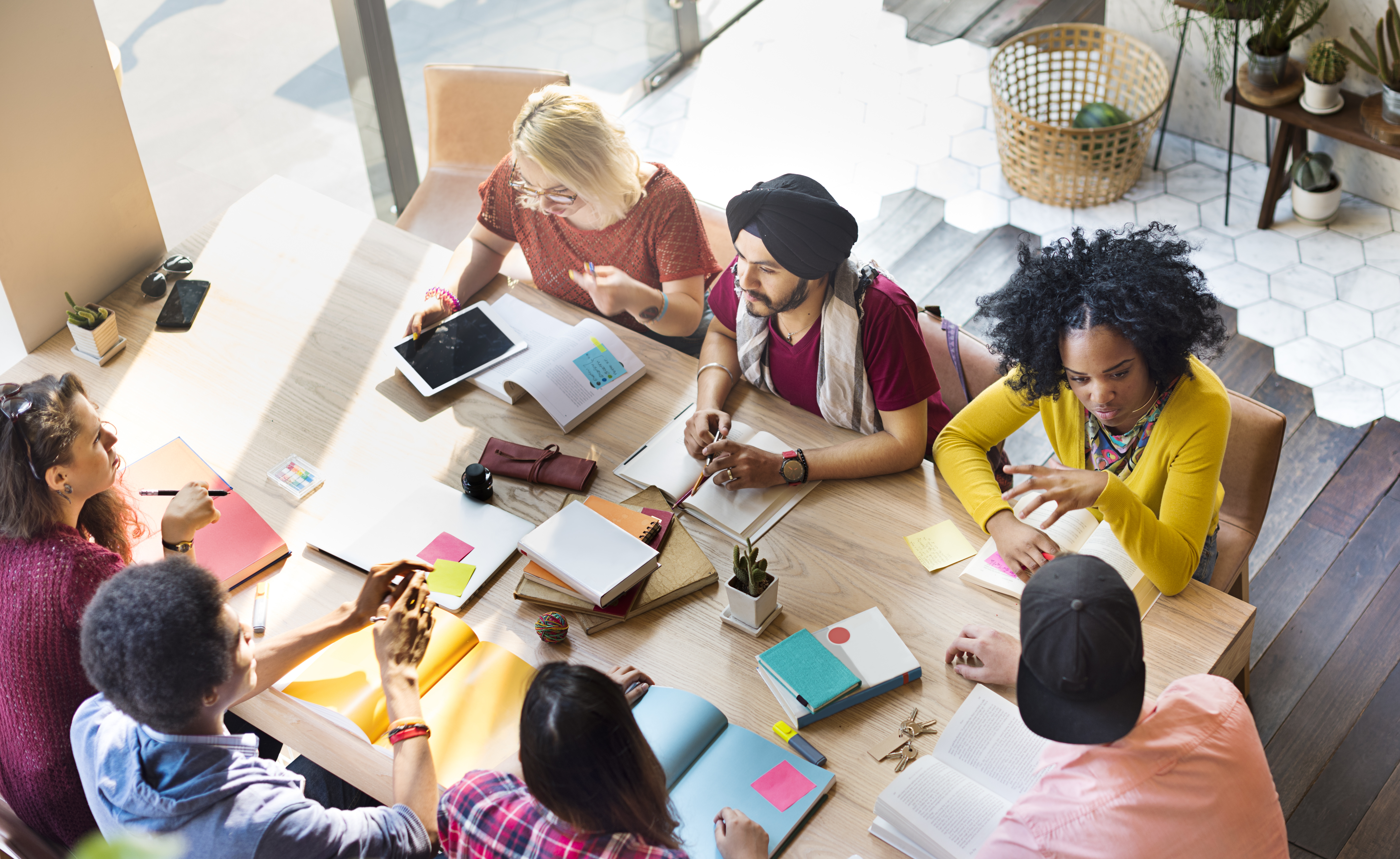 A group of people working on a marketing strategy