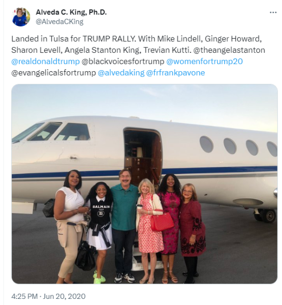 Mike Lindell with family in front of a jet