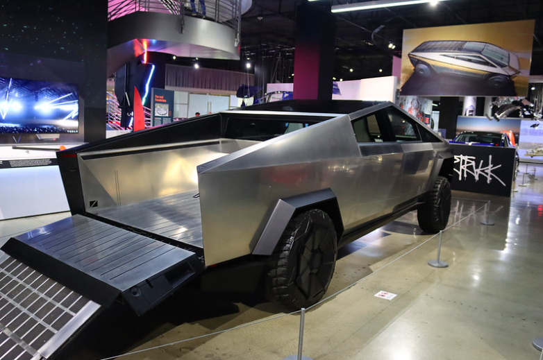 tesla threatens to sue customers for up to $50K if they sell their cybertruck