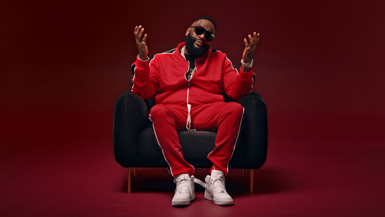 Rick Ross in a chair