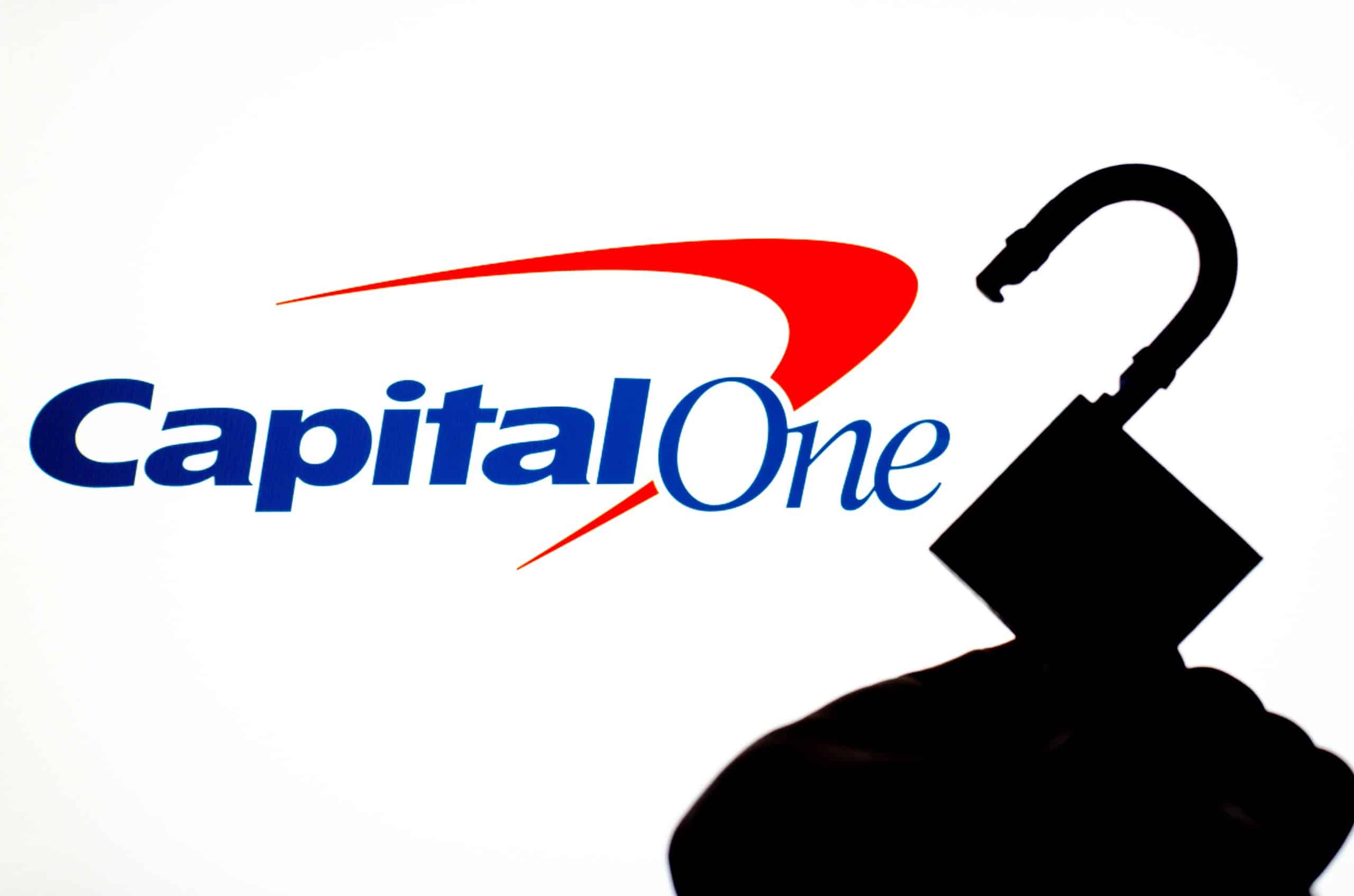 Capital One logo with silhouette of unlocked lock