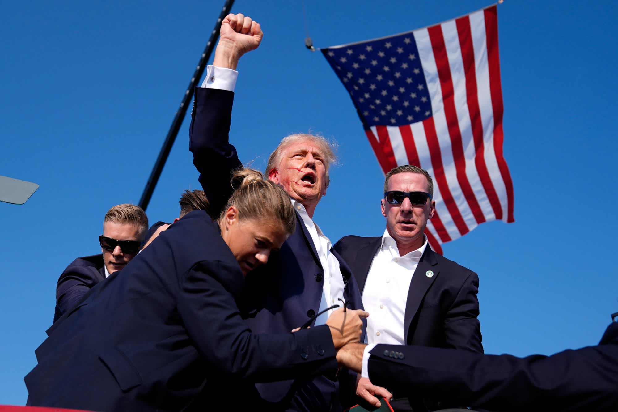 trump pumping fist after shots fired