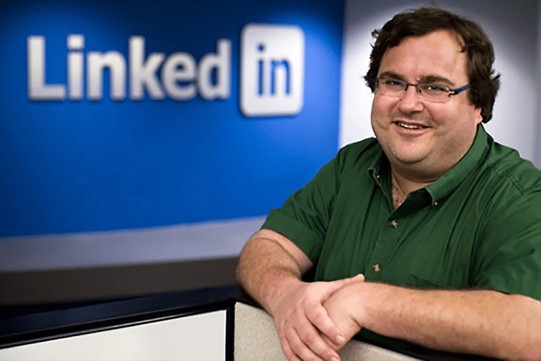 Reid Hoffman in front of linkedin logo
