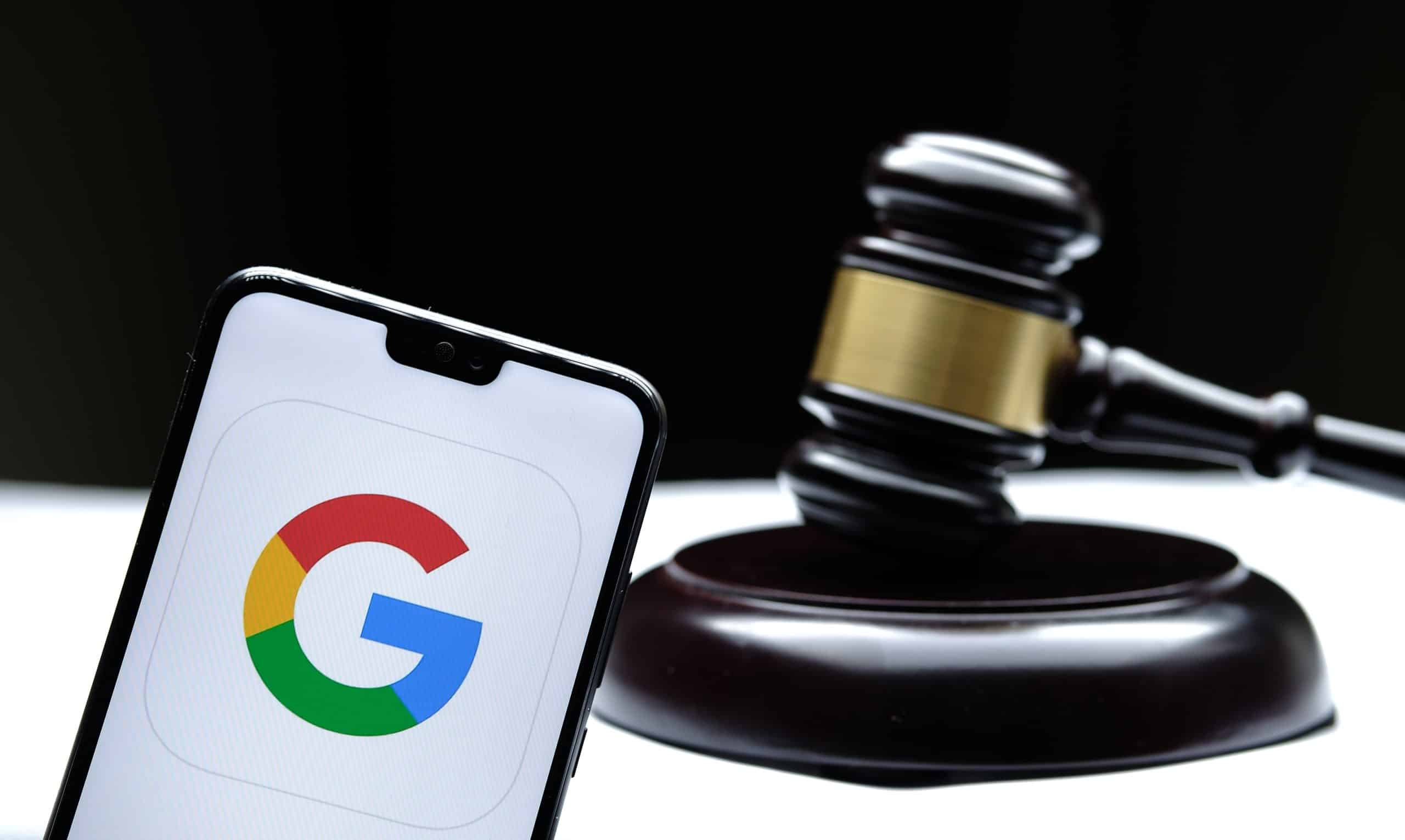 Google logo on a phone with a gavel in the background